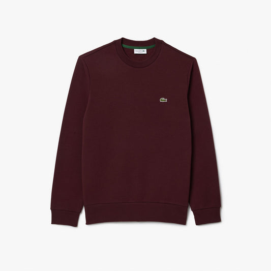 Maroon sweatshirt with a small logo on a white background