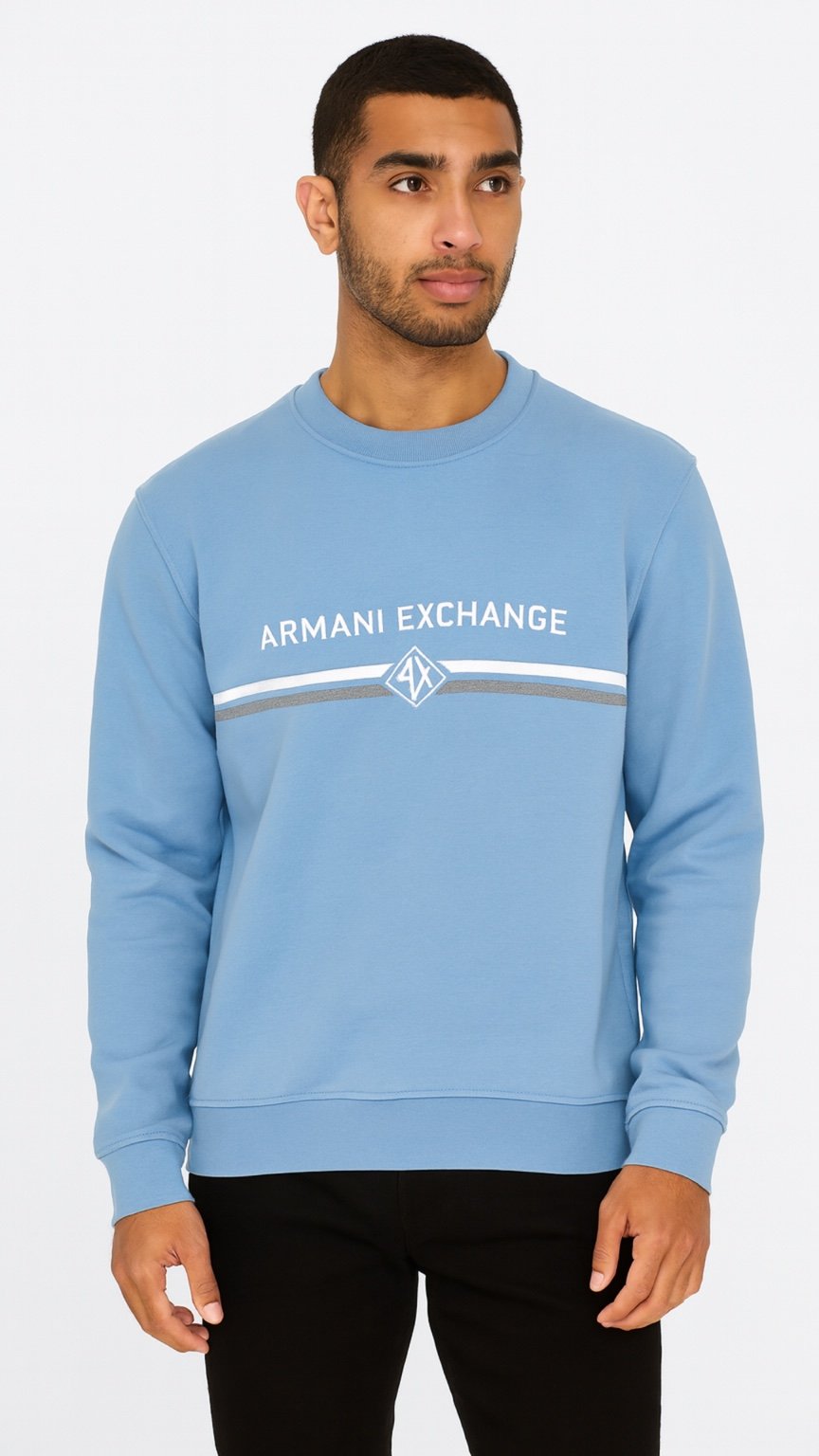 Man wearing a light blue Armani Exchange sweatshirt on a white background