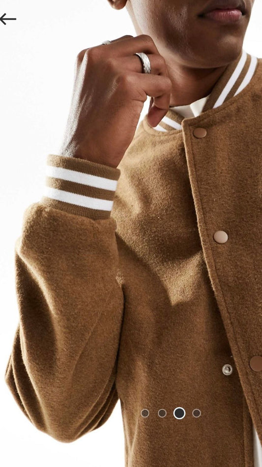 Brown coat with white stripes on sleeves against a white background