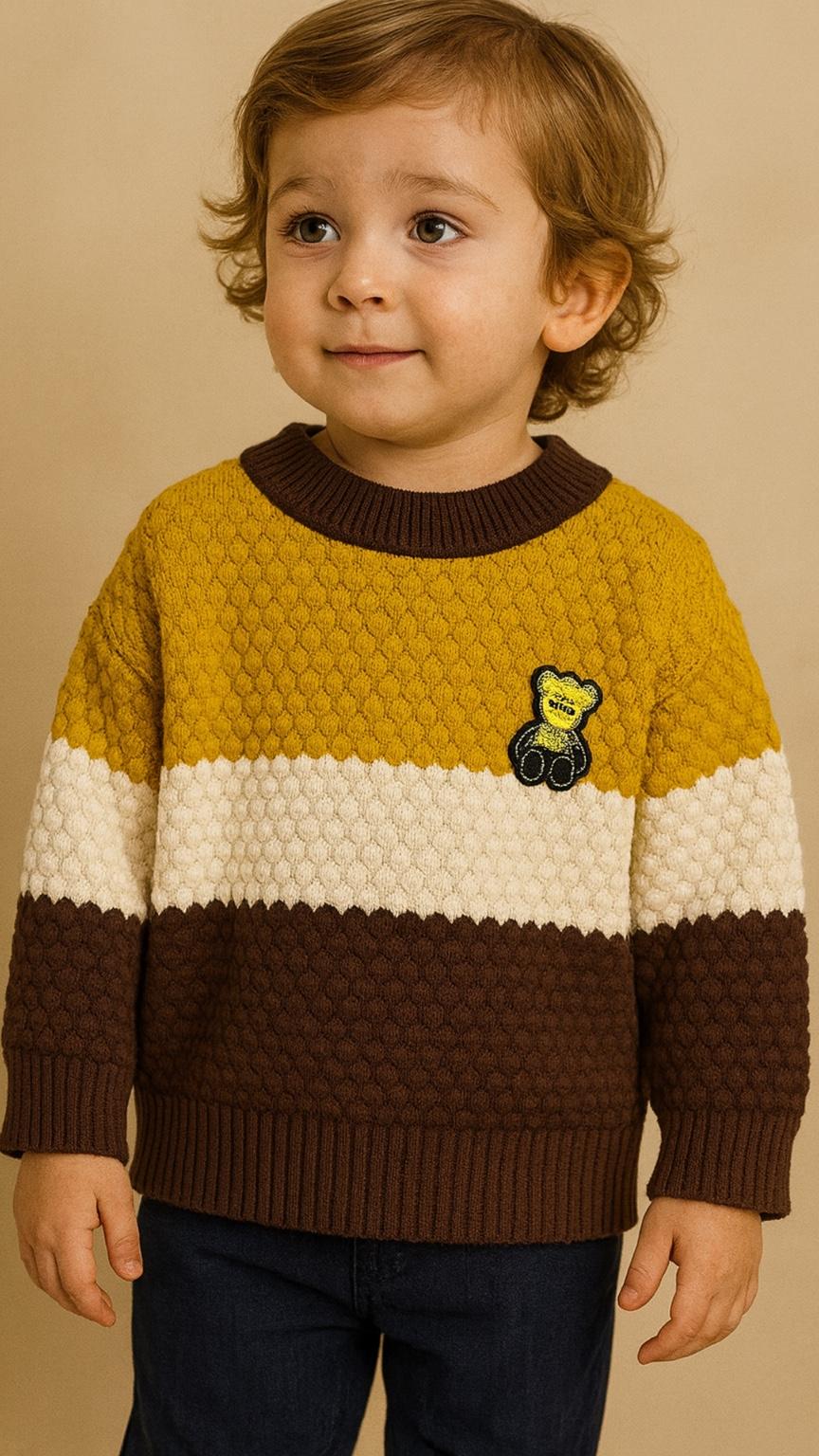 Child wearing a colorful sweater with a bear emblem on a beige background