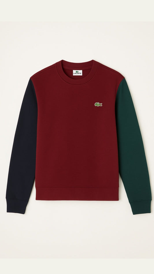 Color-blocked long-sleeve shirt with a brand logo on a white background