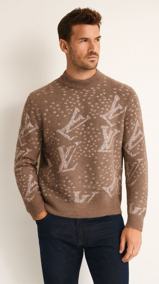 Man wearing a brown sweater with a pattern against a white background