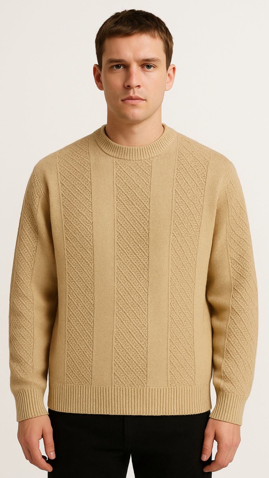 Man wearing a beige cable knit sweater on a white background