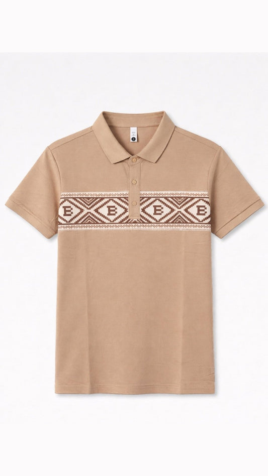 Beige polo shirt with a patterned chest design on a white background