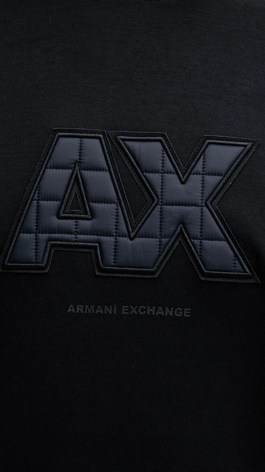 Armani Exchange logo on a black background