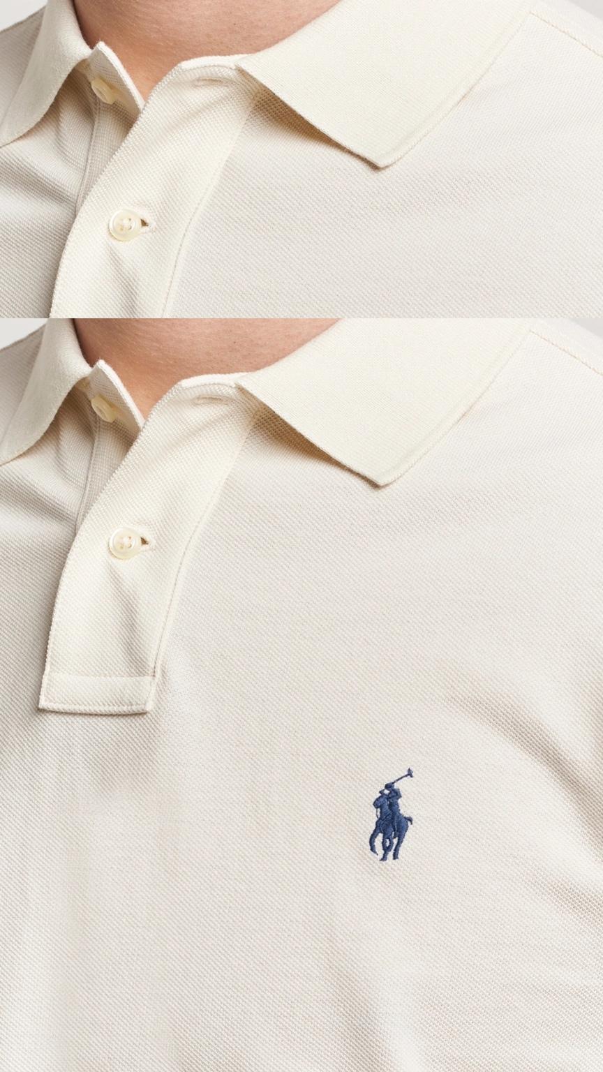 Close-up of a beige polo shirt with a small logo on a white background