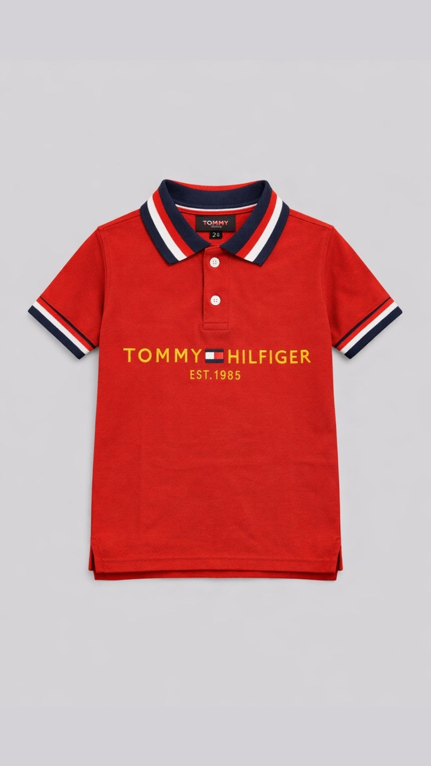 Red Tommy Hilfiger polo shirt on a gray background