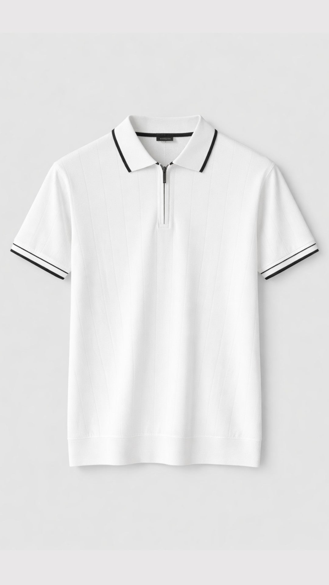 White polo shirt with black trim on a light gray background