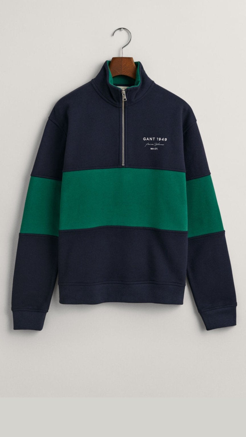 Navy and green color-blocked sweatshirt with a brand logo on a white background