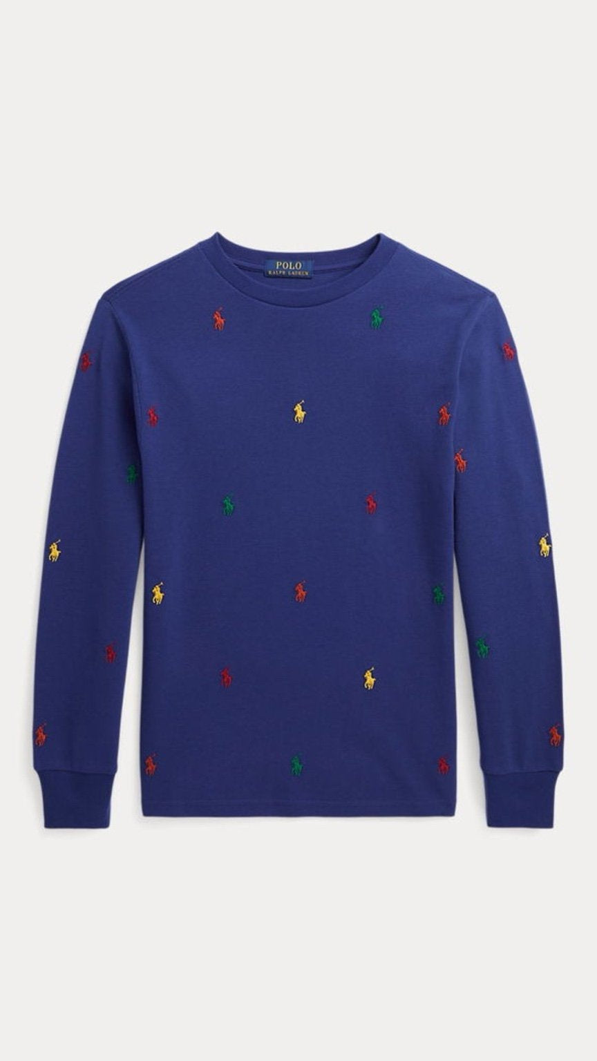 Blue sweater with colorful embroidered polo logos on a white background