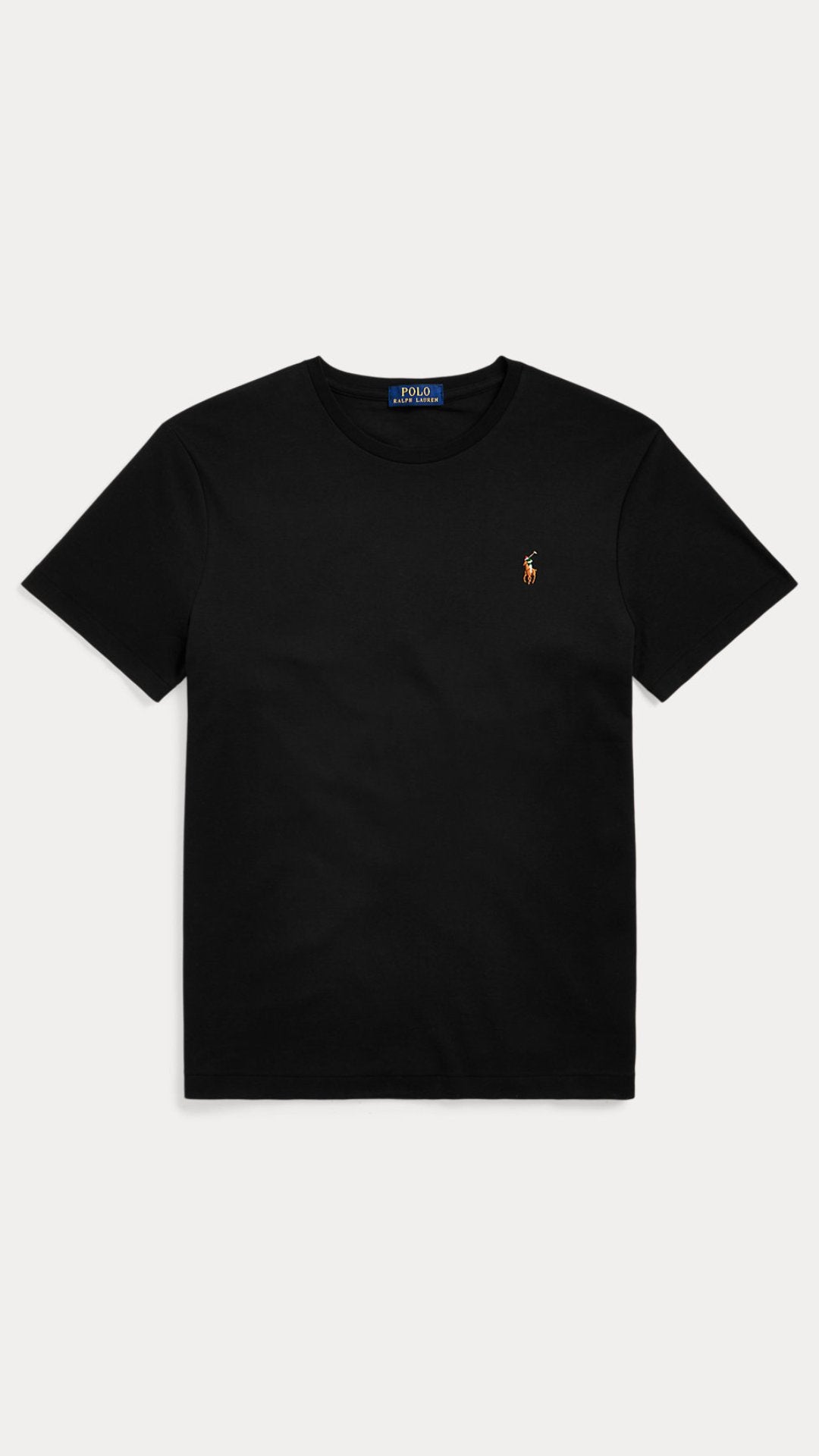 Black t-shirt with a small logo on a light gray background