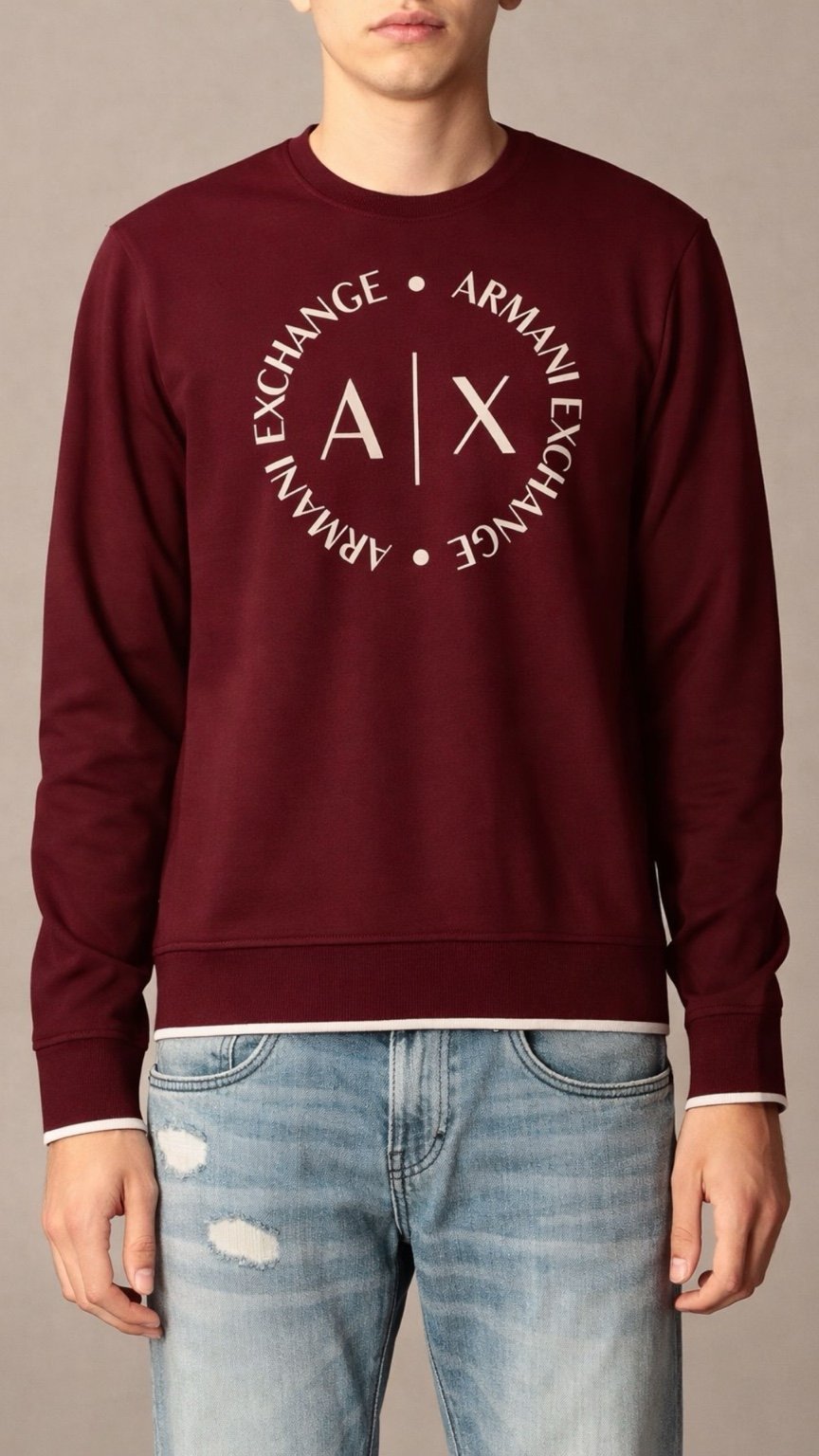 Maroon sweatshirt with Armani Exchange logo worn by a person on a neutral background
