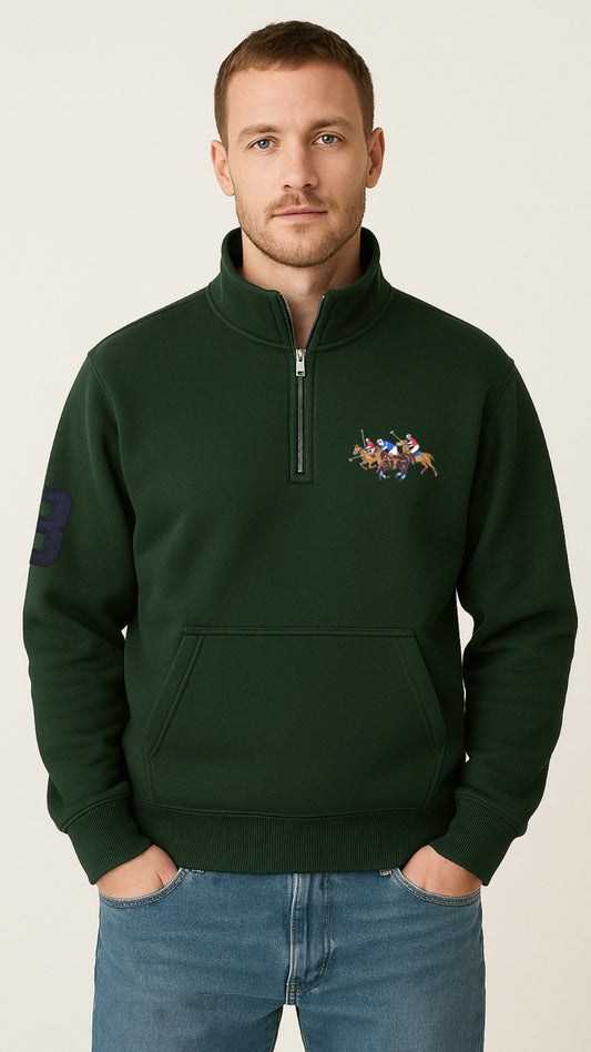 Man wearing a dark green sweatshirt with a logo on a beige background