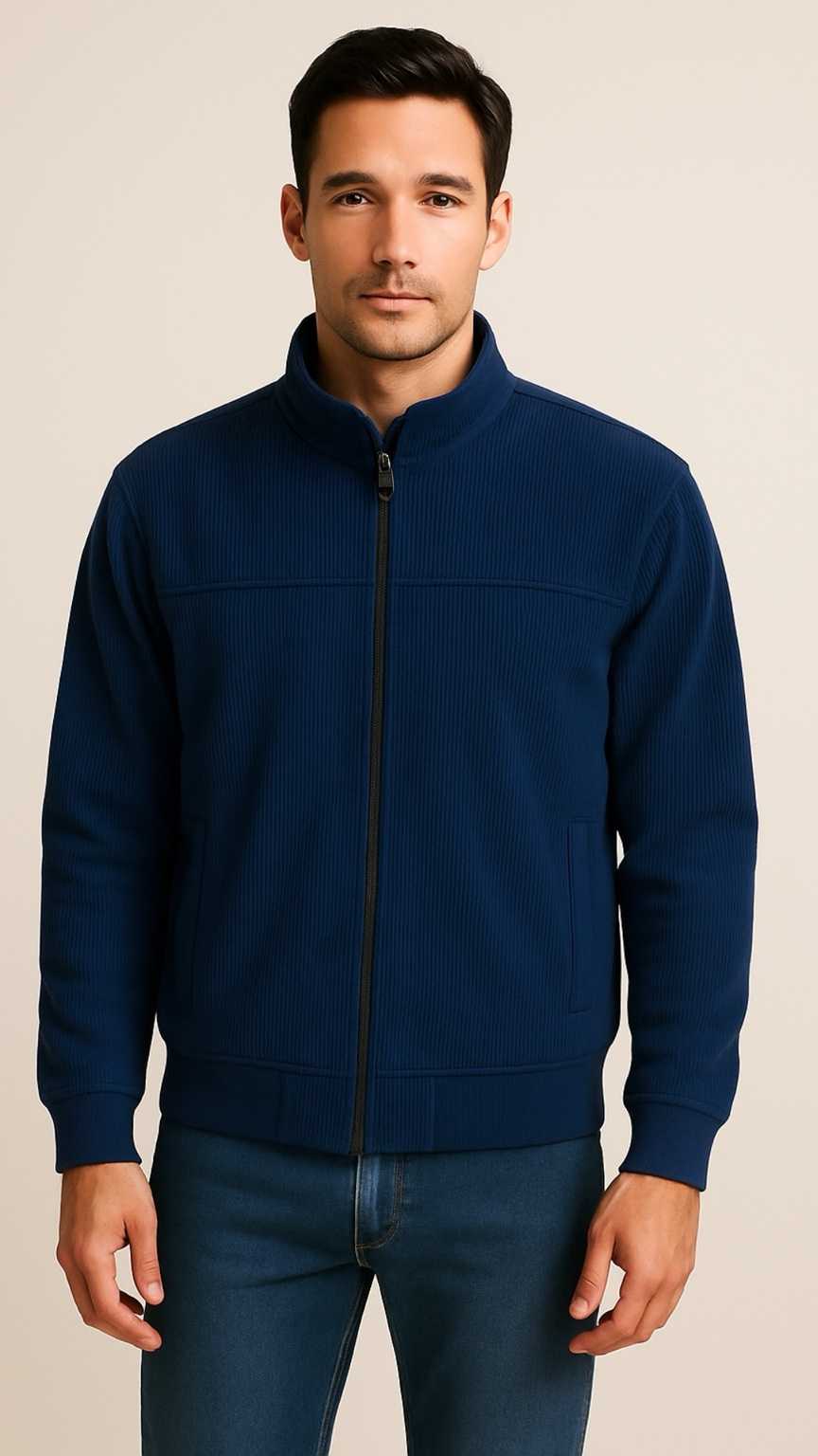 Man wearing a navy blue jacket on a beige background